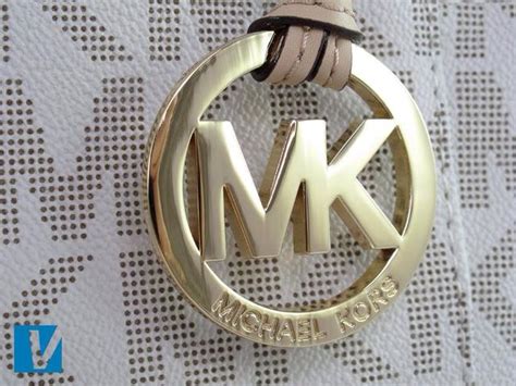 mk logo on michael kors zippers fake|michael kors handbags fake.